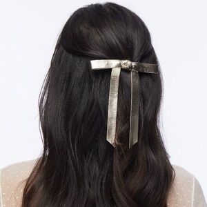 LELE SADOUGHI GOLD BARDOT FAUX LEATHER BOW